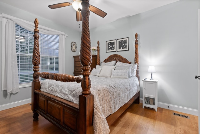 212 Smith St, Signal Mountain, TN 37377 - bedroom with baseboards, light wood-style flooring, and a ceiling fan