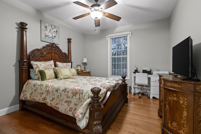 212 Smith St, Signal Mountain, TN 37377 - bedroom with wood finished floors, a desk, a ceiling fan, and baseboards