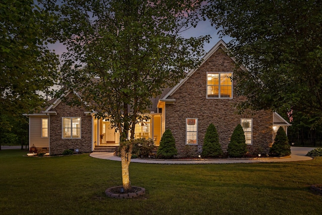 212 Smith St, Signal Mountain, TN 37377 - view of front facade featuring a front yard, stone siding, and crawl space