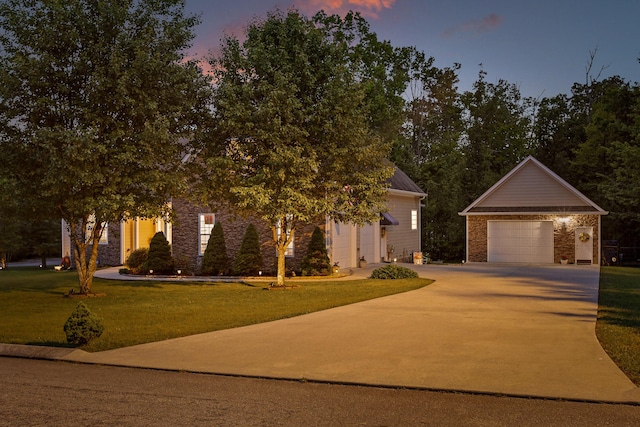 212 Smith St, Signal Mountain, TN 37377 - view of front of home with driveway, an outbuilding, a yard, and stone siding