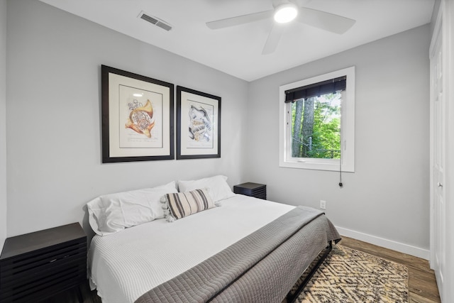 618 Hamilton Ave, Chattanooga, TN 37405 - bedroom featuring baseboards, wood finished floors, and a ceiling fan