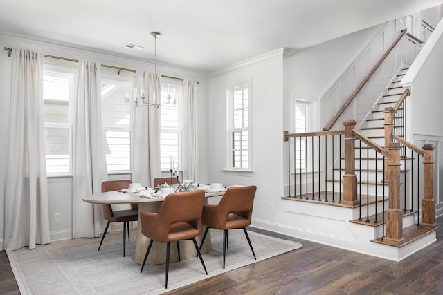 1872 Emmeline Way Unit 09, Hixson, TN 37343 - dining area with wood finished floors, healthy amount of natural light, stairs, and crown molding