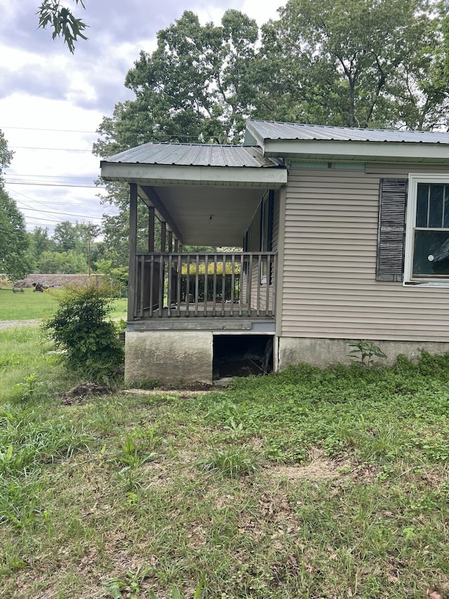 view of home's exterior with metal roof