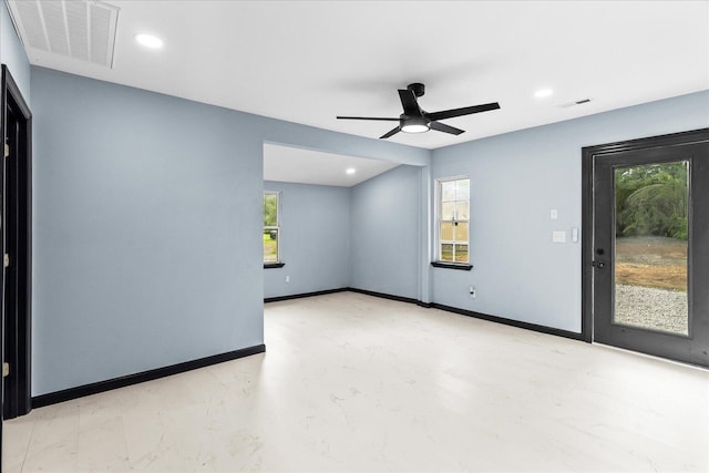 empty room with ceiling fan, visible vents, and recessed lighting
