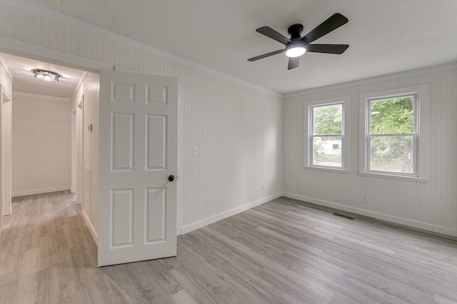 9 Longstreet Rd, Rossville, GA 30741 - empty room with crown molding, light wood-style floors, a ceiling fan, and baseboards