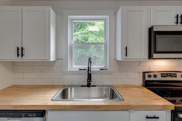 9 Longstreet Rd, Rossville, GA 30741 - kitchen with appliances with stainless steel finishes, a sink, butcher block countertops, and white cabinetry