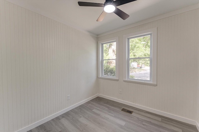 9 Longstreet Rd, Rossville, GA 30741 - empty room with light wood-type flooring, a ceiling fan, and baseboards