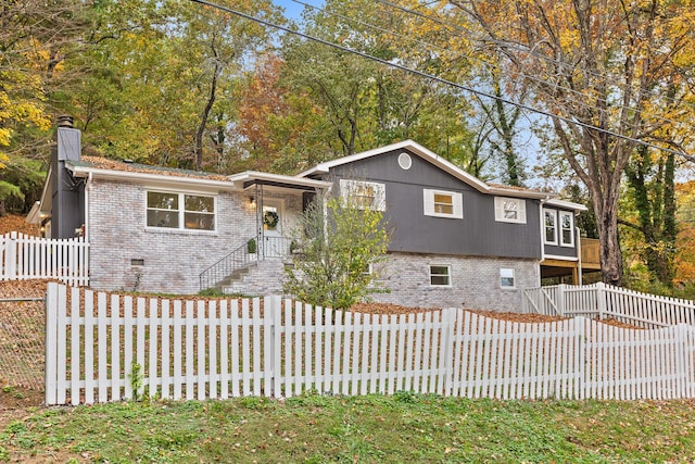 3235 Haywood Ave, Chattanooga, TN 37415 - tri-level home with brick siding and a chimney