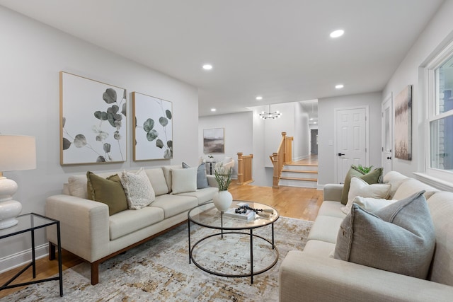 3235 Haywood Ave, Chattanooga, TN 37415 - living area featuring recessed lighting, stairway, wood finished floors, and a notable chandelier