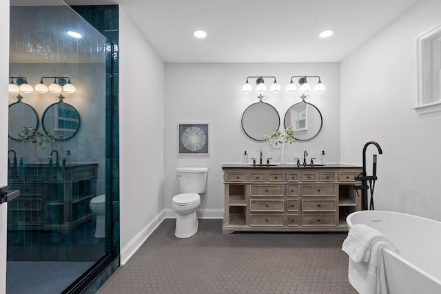 3235 Haywood Ave, Chattanooga, TN 37415 - full bath featuring toilet, a sink, a tile shower, a freestanding tub, and double vanity