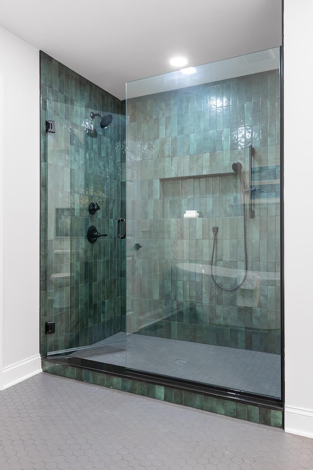 3235 Haywood Ave, Chattanooga, TN 37415 - bathroom featuring baseboards, a shower stall, and tile patterned flooring