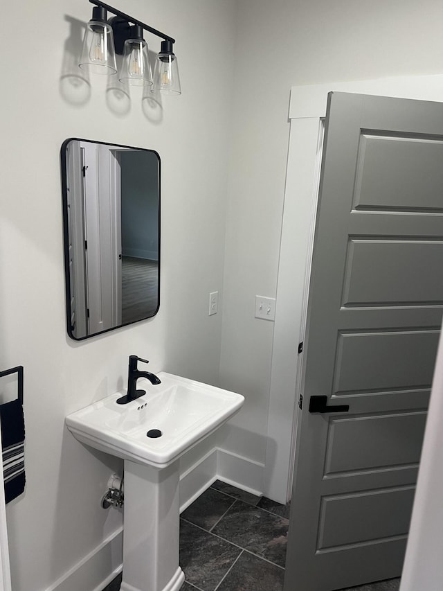 bathroom with baseboards