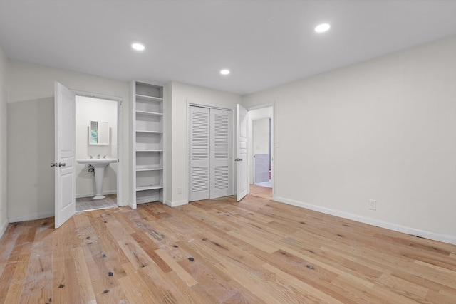 3000 Mary Walker Pl, Chattanooga, TN 37411 - unfurnished bedroom featuring baseboards, wood finished floors, recessed lighting, and ensuite bathroom
