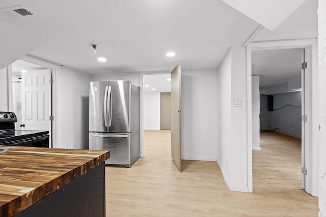 3000 Mary Walker Pl, Chattanooga, TN 37411 - kitchen with freestanding refrigerator, black / electric stove, wood counters, light wood finished floors, and baseboards