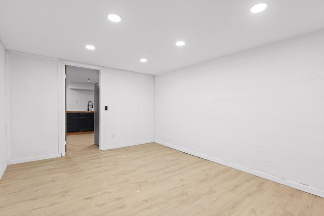 3000 Mary Walker Pl, Chattanooga, TN 37411 - empty room with light wood-type flooring, baseboards, recessed lighting, and a sink