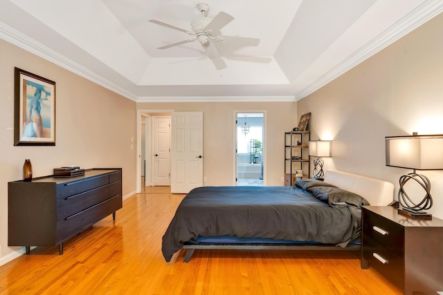 802 Creek Overlook Rd, Chattanooga, TN 37415 - bedroom featuring a raised ceiling, light wood-style flooring, ornamental molding, ensuite bath, and ceiling fan