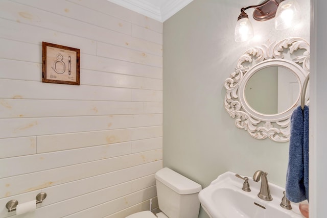 802 Creek Overlook Rd, Chattanooga, TN 37415 - half bath with toilet, a sink, wooden walls, and crown molding