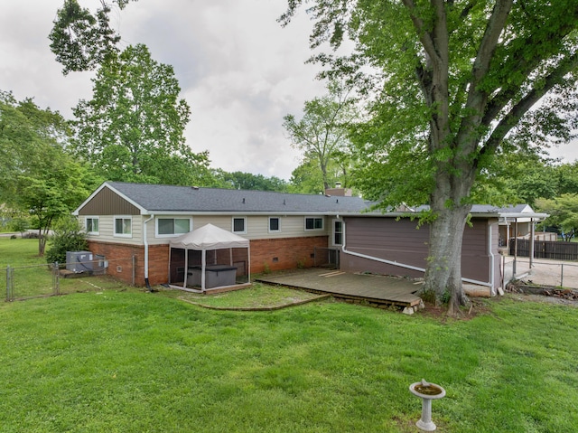 6904 Hickory View Ln, Chattanooga, TN 37421 - rear view of property featuring brick siding, a deck, a hot tub, and a chimney