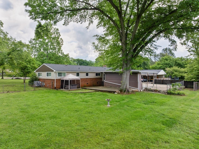 6904 Hickory View Ln, Chattanooga, TN 37421 - back of house featuring brick siding, a gazebo, and a patio