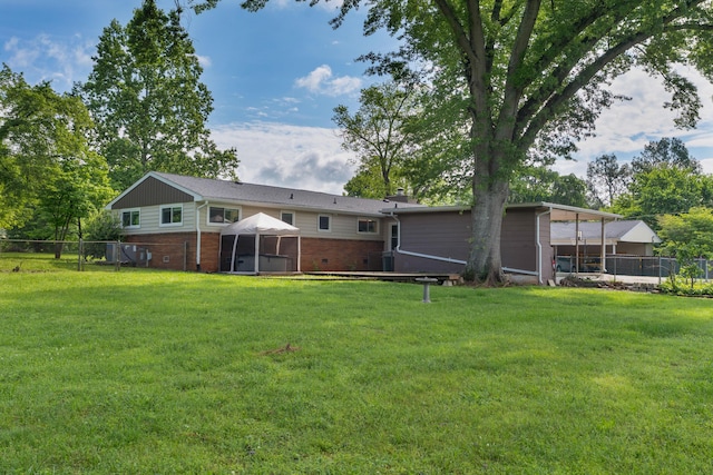 6904 Hickory View Ln, Chattanooga, TN 37421 - rear view of house with brick siding and a gazebo