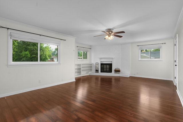 6904 Hickory View Ln, Chattanooga, TN 37421 - unfurnished living room featuring ceiling fan, wood finished floors, baseboards, a fireplace, and crown molding