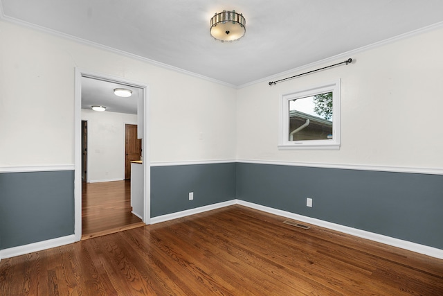 6904 Hickory View Ln, Chattanooga, TN 37421 - spare room featuring crown molding, baseboards, and wood finished floors