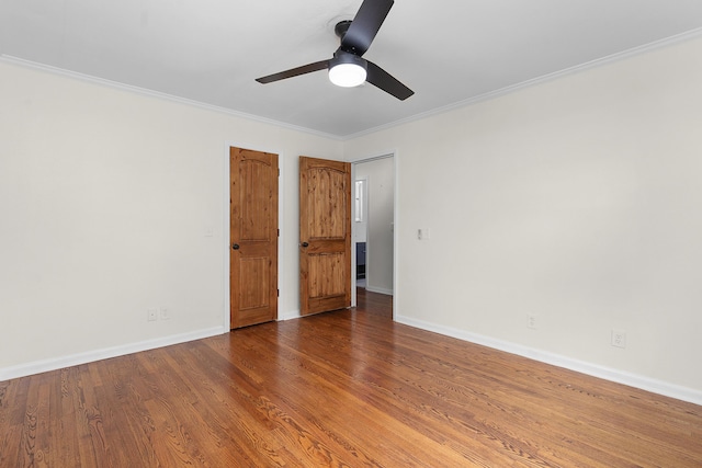 6904 Hickory View Ln, Chattanooga, TN 37421 - empty room with a ceiling fan, baseboards, wood finished floors, and crown molding