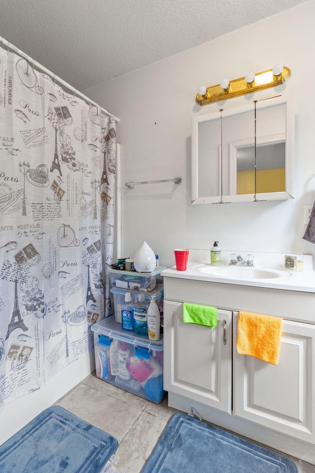 2121 Davenport St, Chattanooga, TN 37406 - bathroom with vanity, a textured ceiling, and a shower with shower curtain