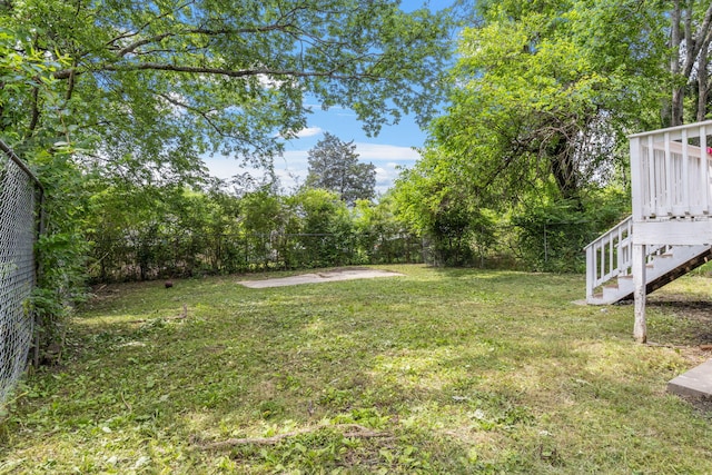 2121 Davenport St, Chattanooga, TN 37406 - view of yard with stairs, a deck, and view of wooded area