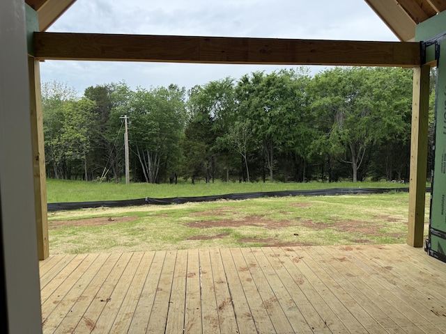 134 River Ridge Drive Unit 117, Dunlap, TN 37327 - wooden terrace with a lawn and view of wooded area