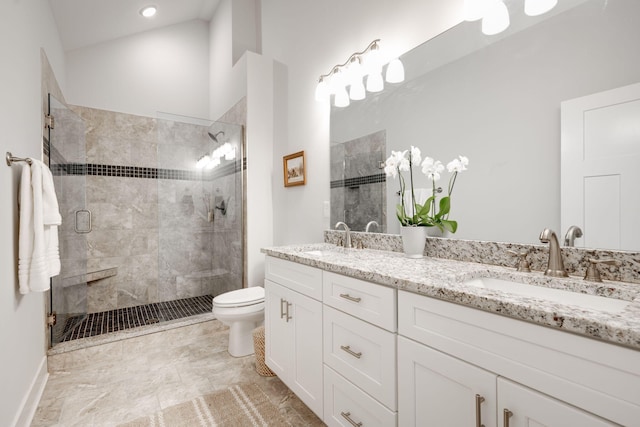 68 Rock Bridge Dr, Ringgold, GA 30736 - bathroom with tiled shower, double vanity, toilet, and baseboards