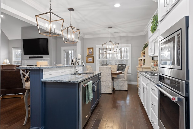 7258 Grey Hawk Trl, Signal Mountain, TN 37377 - kitchen with appliances with stainless steel finishes, a chandelier, a sink, open floor plan, and recessed lighting