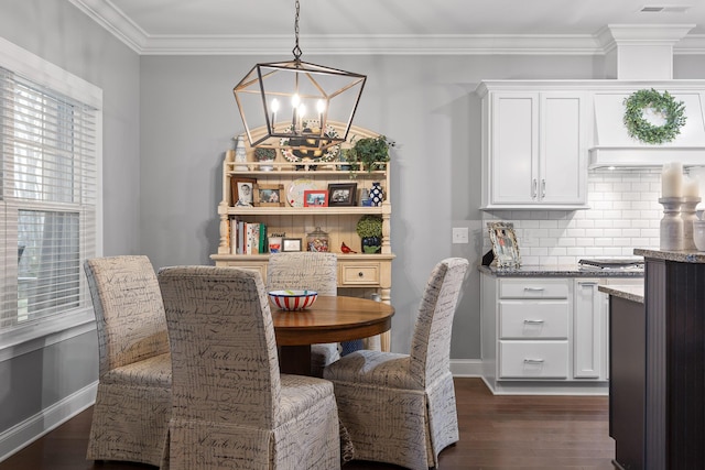 7258 Grey Hawk Trl, Signal Mountain, TN 37377 - dining area featuring a chandelier, dark wood-style flooring, crown molding, and baseboards