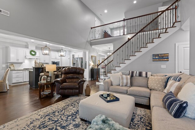 7258 Grey Hawk Trl, Signal Mountain, TN 37377 - living room with stairway, dark wood-style flooring, recessed lighting, and a towering ceiling