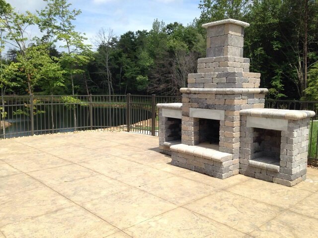 7258 Grey Hawk Trl, Signal Mountain, TN 37377 - view of patio / terrace featuring an outdoor brick fireplace