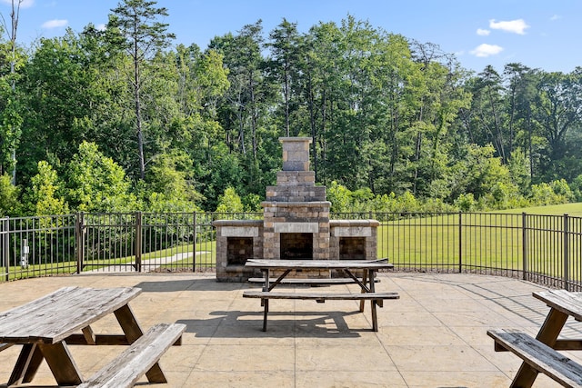 7258 Grey Hawk Trl, Signal Mountain, TN 37377 - view of patio / terrace with an outdoor stone fireplace