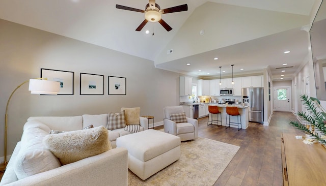 1105 18th St NW, Cleveland, TN 37311 - living room featuring ceiling fan, hardwood / wood-style floors, recessed lighting, high vaulted ceiling, and baseboards