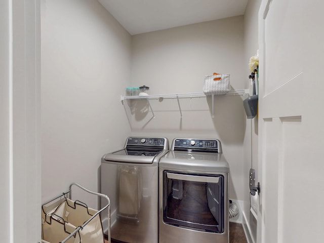 1105 18th St NW, Cleveland, TN 37311 - laundry room with washing machine and dryer and baseboards