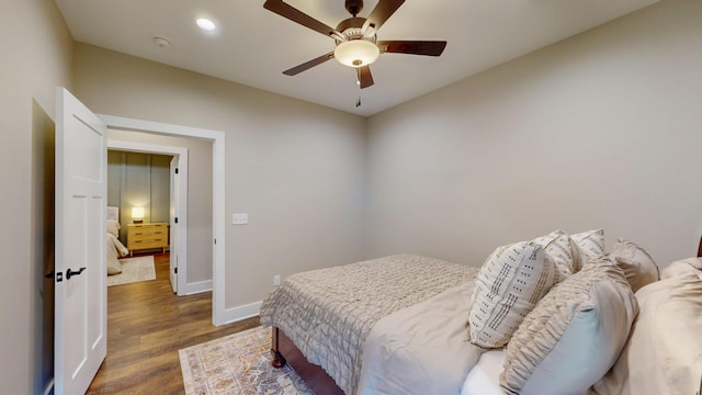1105 18th St NW, Cleveland, TN 37311 - bedroom featuring wood finished floors, baseboards, ceiling fan, and recessed lighting