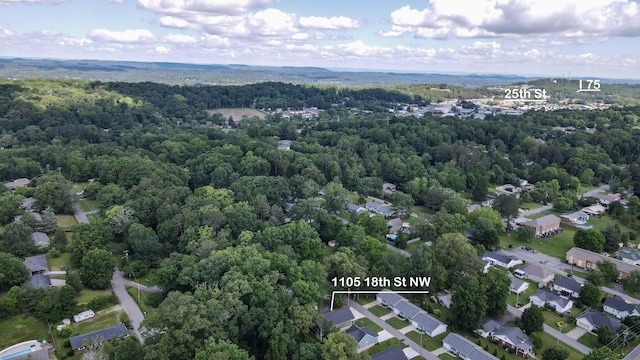 1105 18th St NW, Cleveland, TN 37311 - aerial view of property and surrounding area with a forest