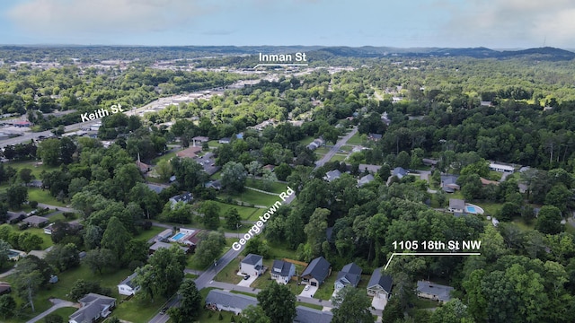 1105 18th St NW, Cleveland, TN 37311 - aerial overview of property's location with a heavily wooded area