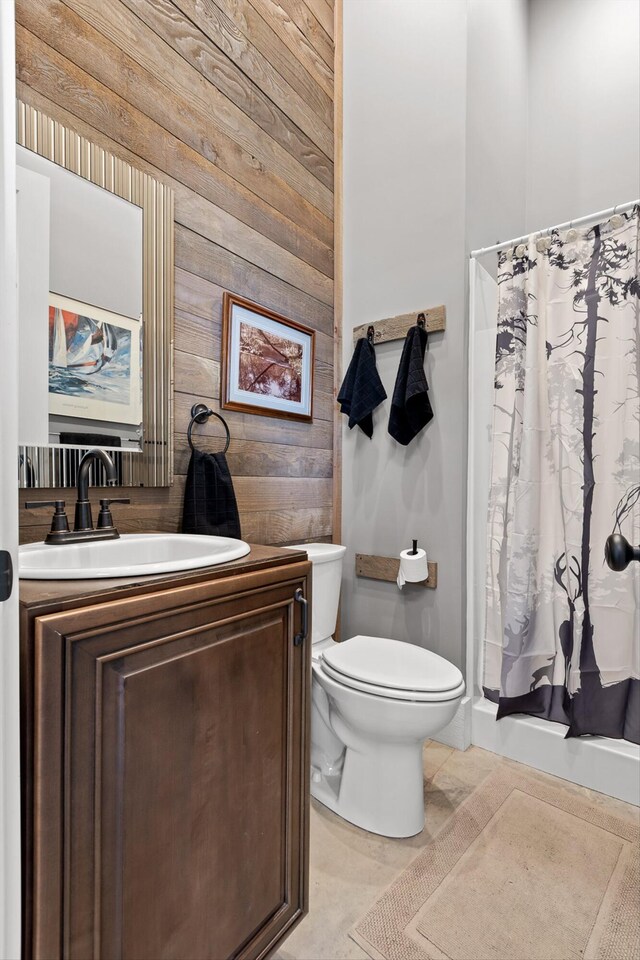 6835 Jasper Highlands Blvd, Jasper, TN 37347 - full bath with wood walls, toilet, vanity, and a shower with curtain