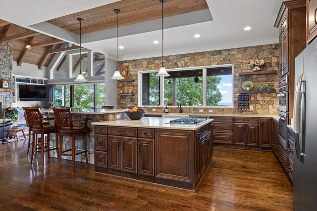 6835 Jasper Highlands Blvd, Jasper, TN 37347 - kitchen with light countertops, dark wood-type flooring, appliances with stainless steel finishes, a sink, and open shelves