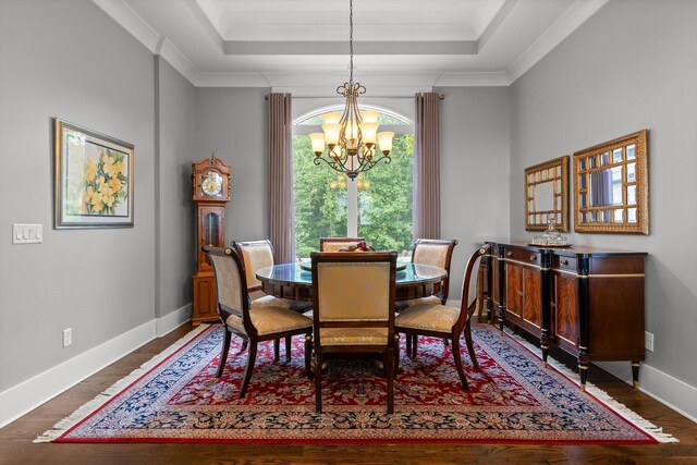 6835 Jasper Highlands Blvd, Jasper, TN 37347 - dining space featuring a chandelier, a raised ceiling, wood finished floors, baseboards, and ornamental molding