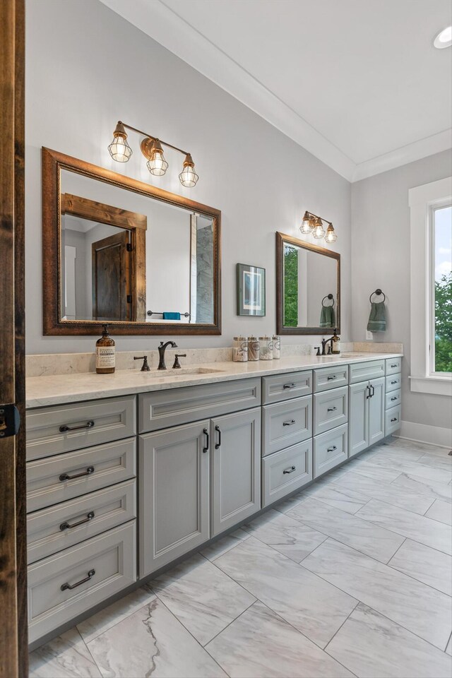 6835 Jasper Highlands Blvd, Jasper, TN 37347 - bathroom featuring marble look tiles, double vanity, and crown molding