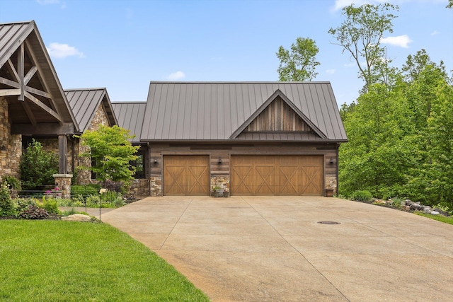 6835 Jasper Highlands Blvd, Jasper, TN 37347 - view of front of property with a standing seam roof, a garage, metal roof, stone siding, and concrete driveway