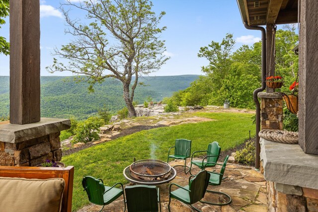 6835 Jasper Highlands Blvd, Jasper, TN 37347 - view of grassy yard featuring a fire pit and a mountain view