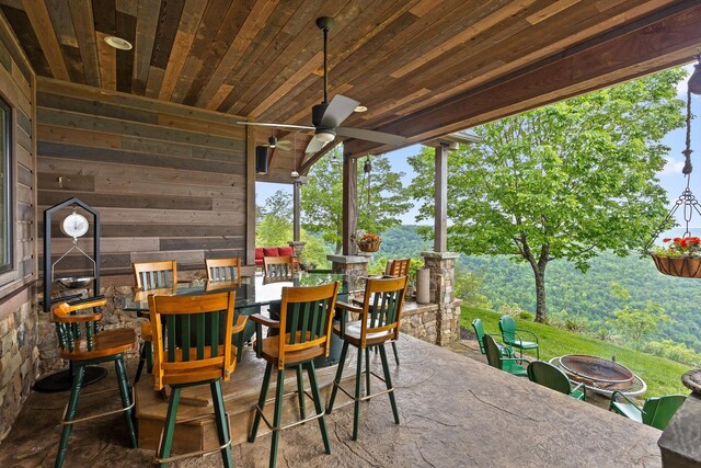 6835 Jasper Highlands Blvd, Jasper, TN 37347 - view of patio / terrace with an outdoor fire pit and outdoor dining area