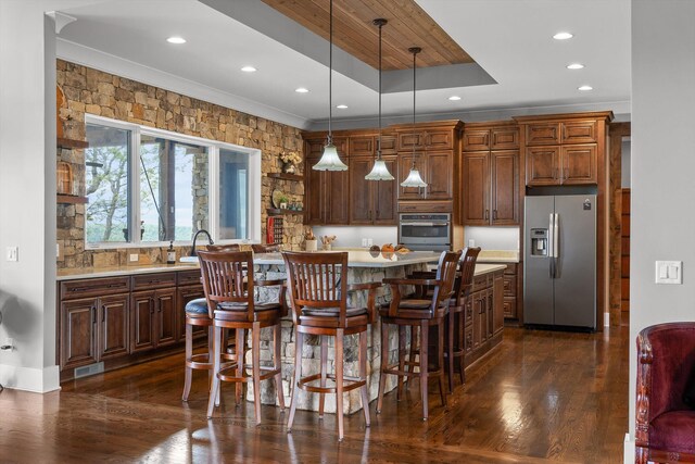6835 Jasper Highlands Blvd, Jasper, TN 37347 - kitchen with stainless steel appliances, dark wood-type flooring, light countertops, a center island, and recessed lighting