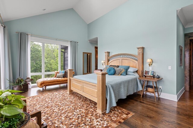 6835 Jasper Highlands Blvd, Jasper, TN 37347 - bedroom featuring wood finished floors, high vaulted ceiling, and baseboards